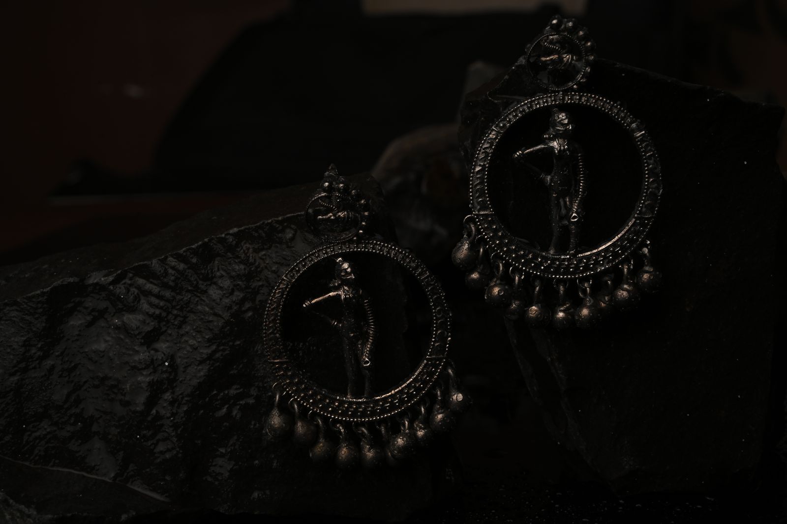 Geometric brass earrings inspired by temple frieze patterns