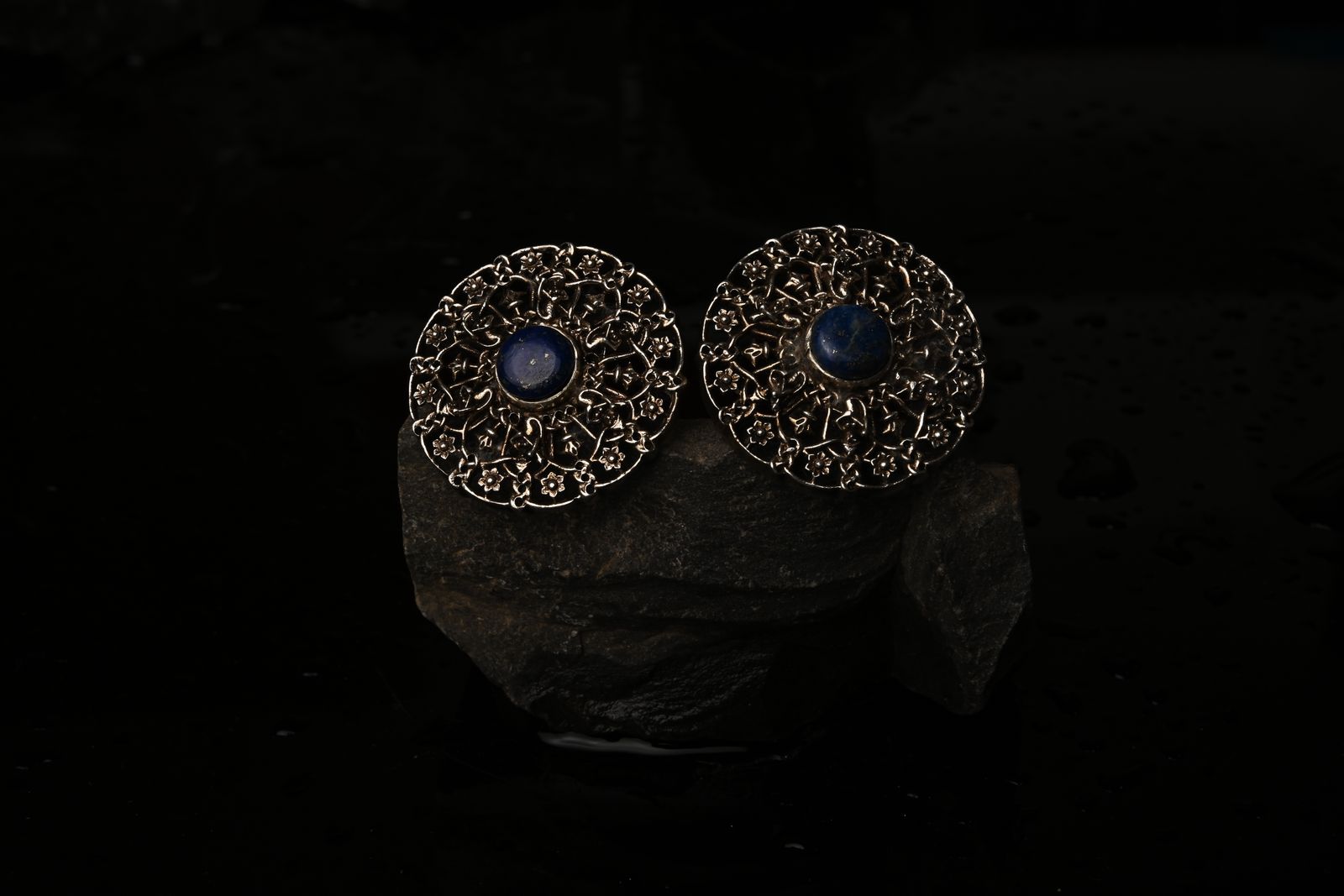 Delicate silver earrings from folk metalwork traditions