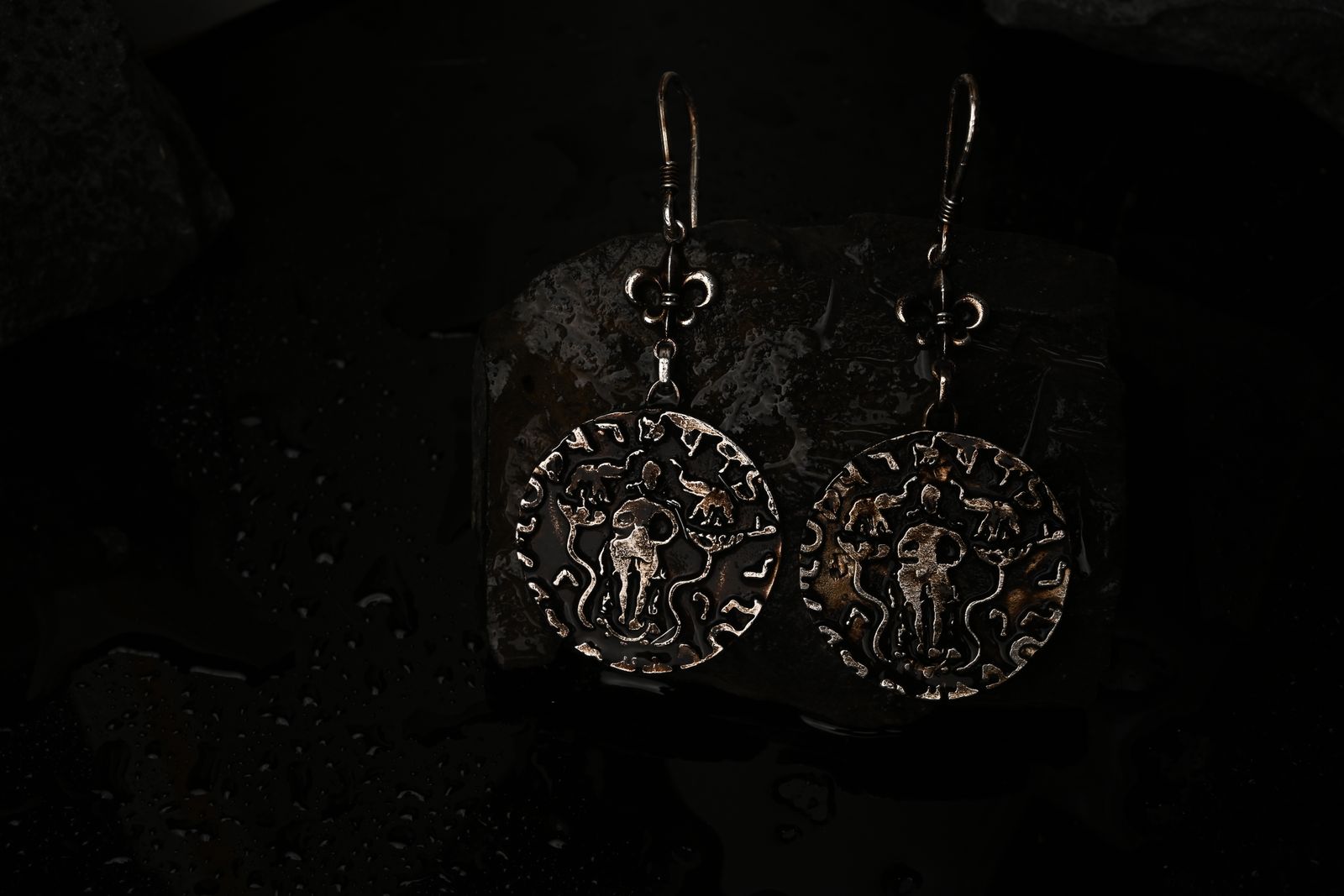 Sculptural brass earrings referencing stepwell architecture — image 3