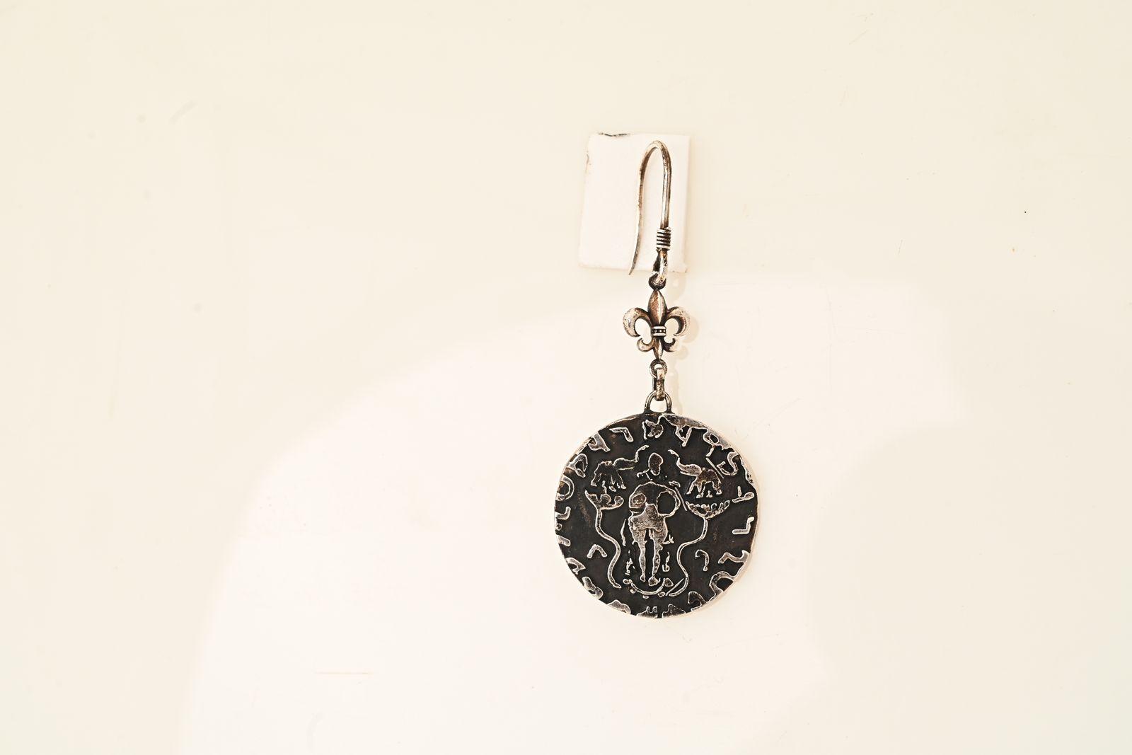 Sculptural brass earrings referencing stepwell architecture — image 5