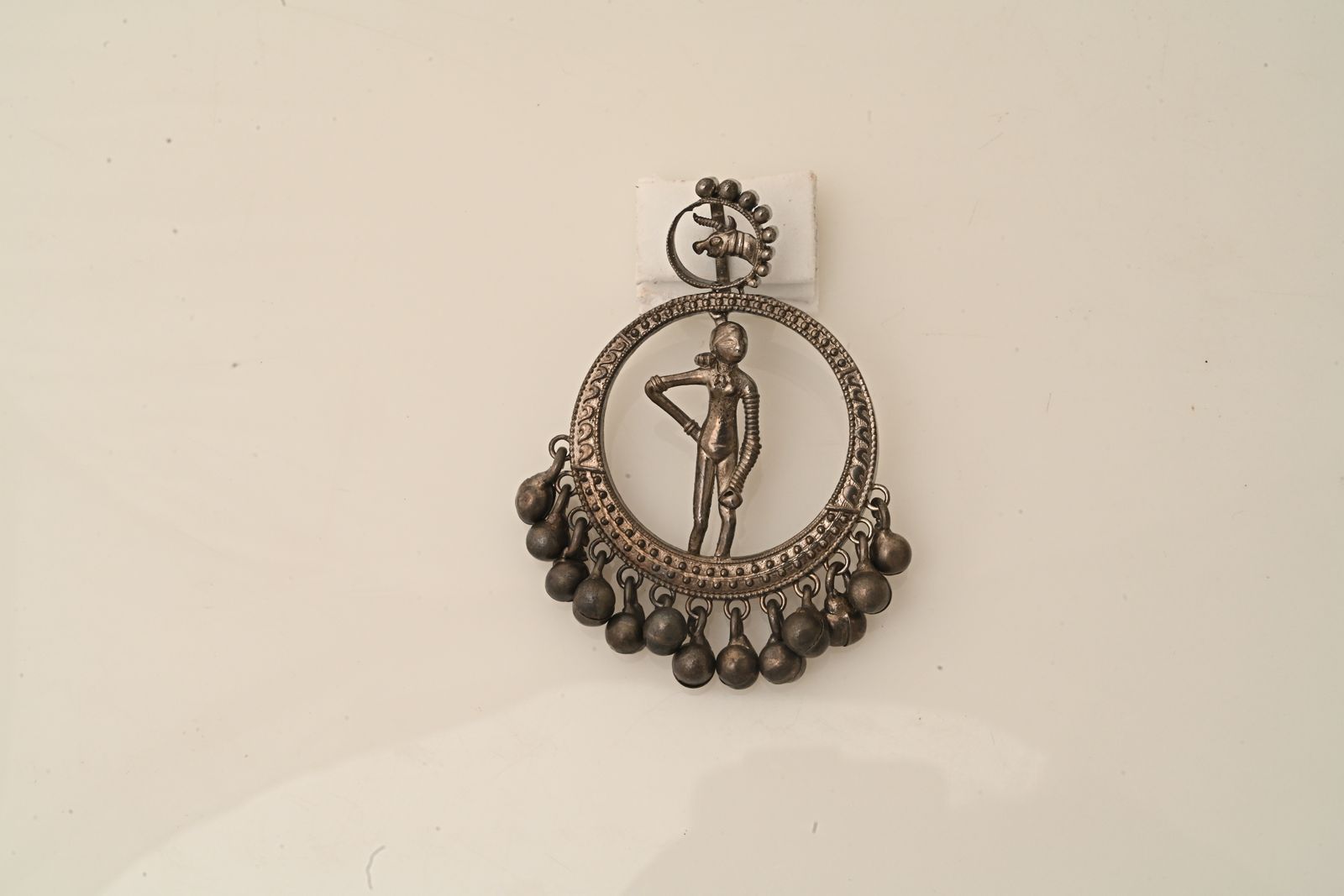 Heritage silver locket inspired by traditional subcontinental forms