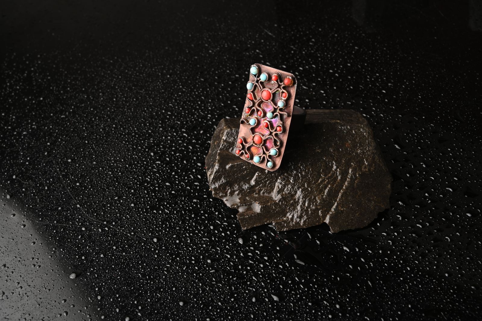 Sculptural bronze ring referencing archaeological forms